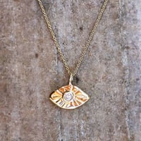 All seeing mini amulet