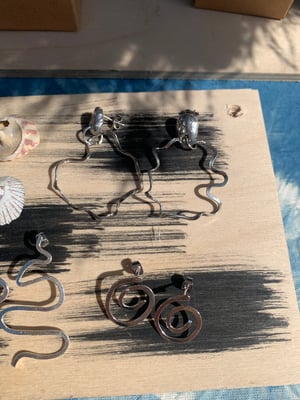 Image of "The pulsation of energy" recycled silver molten earrings