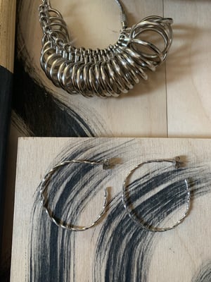Image of ‘Bend my Mind’ twisty silver hoops