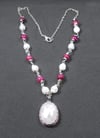 Rose Quartz Pendant on a beaded wrapped necklace