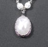 Rose Quartz Pendant on a beaded wrapped necklace