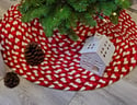 30" red and cream Christmas tree skirt for an artificial tree rug made from braided cotton jersey