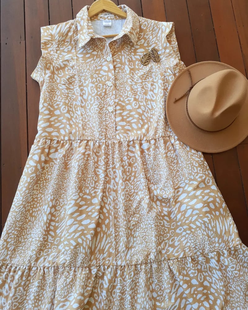 Image of BUTTON UP TIERED DRESS in ANIMAL PRINT.  Available in LARGE.