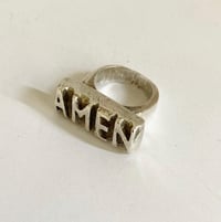 Amen Knuckle Duster