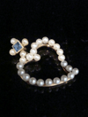 Edwardian 9ct yellow gold sapphire and seed pearl witches heart pendant