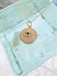 Image 3 of 14k pink opal round disk with diamond evil eye pendant 