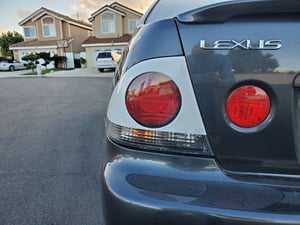 Image of Lexus IS300 Sedan Altezza Tail Light Cover Garnish A0206-2X