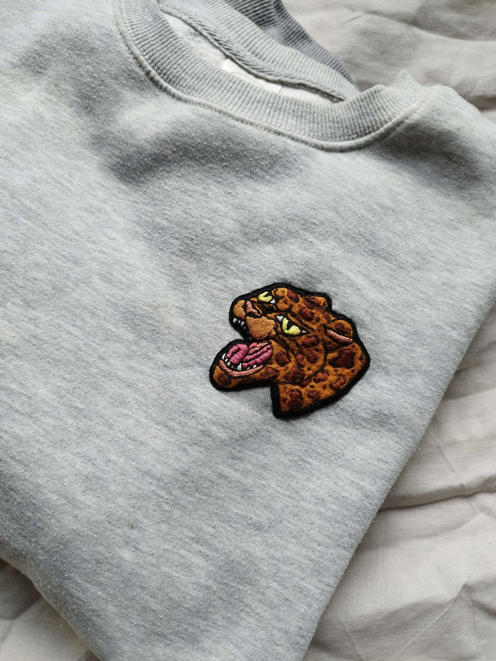 Image of leopard head vintage jumper