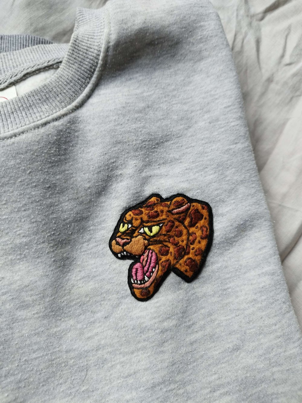 Image of leopard head vintage jumper
