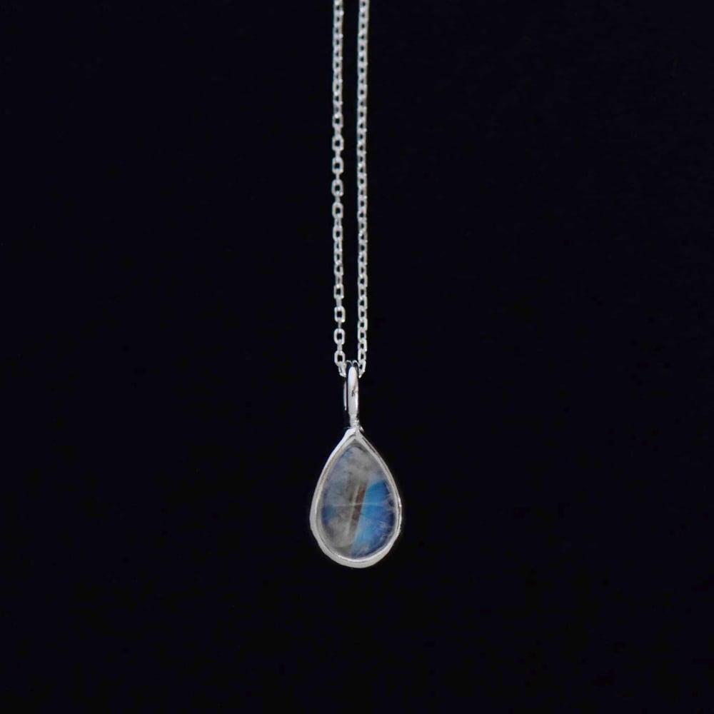 Image of Rainbow Moonstone pear shape cabochon cut silver necklace
