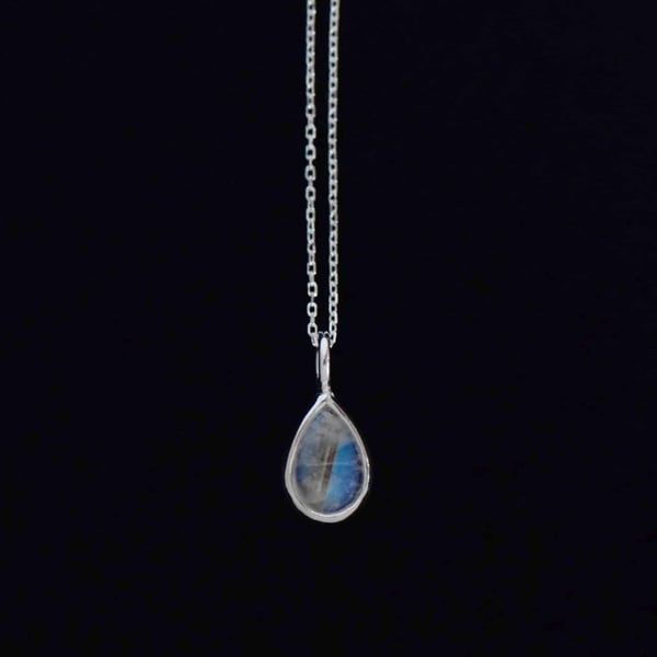 Image of Rainbow Moonstone pear shape cabochon cut silver necklace