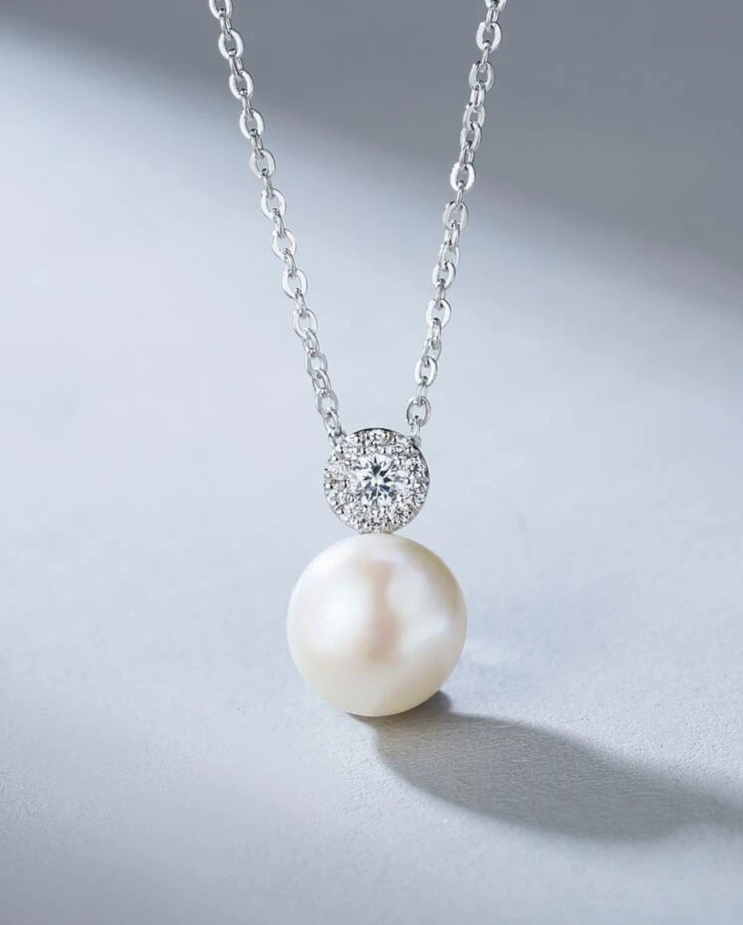 Image of Round CZ and natural pearl 