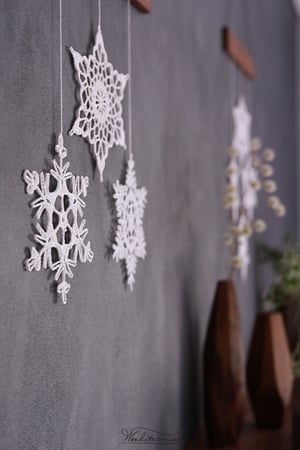 Image of Elegant Christmas holiday home decoration, 3 crochet snowflakes and wood mobile, Christmas wall art