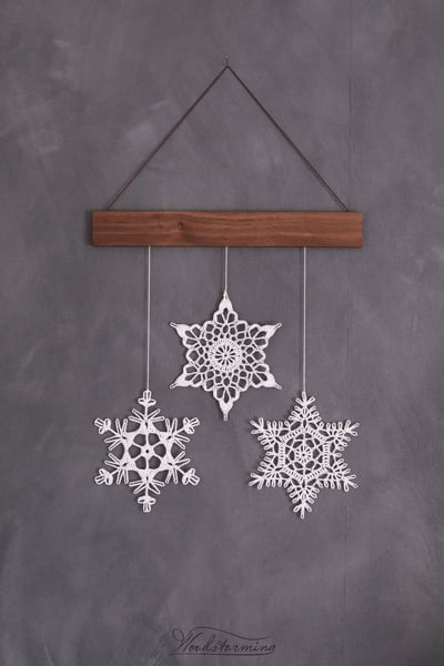 Image of Elegant Christmas holiday home decoration, 3 crochet snowflakes and wood mobile, Christmas wall art