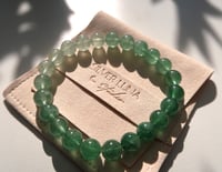 Image 1 of 渐变冰种绿草莓晶 green strawberry quartz bracelet