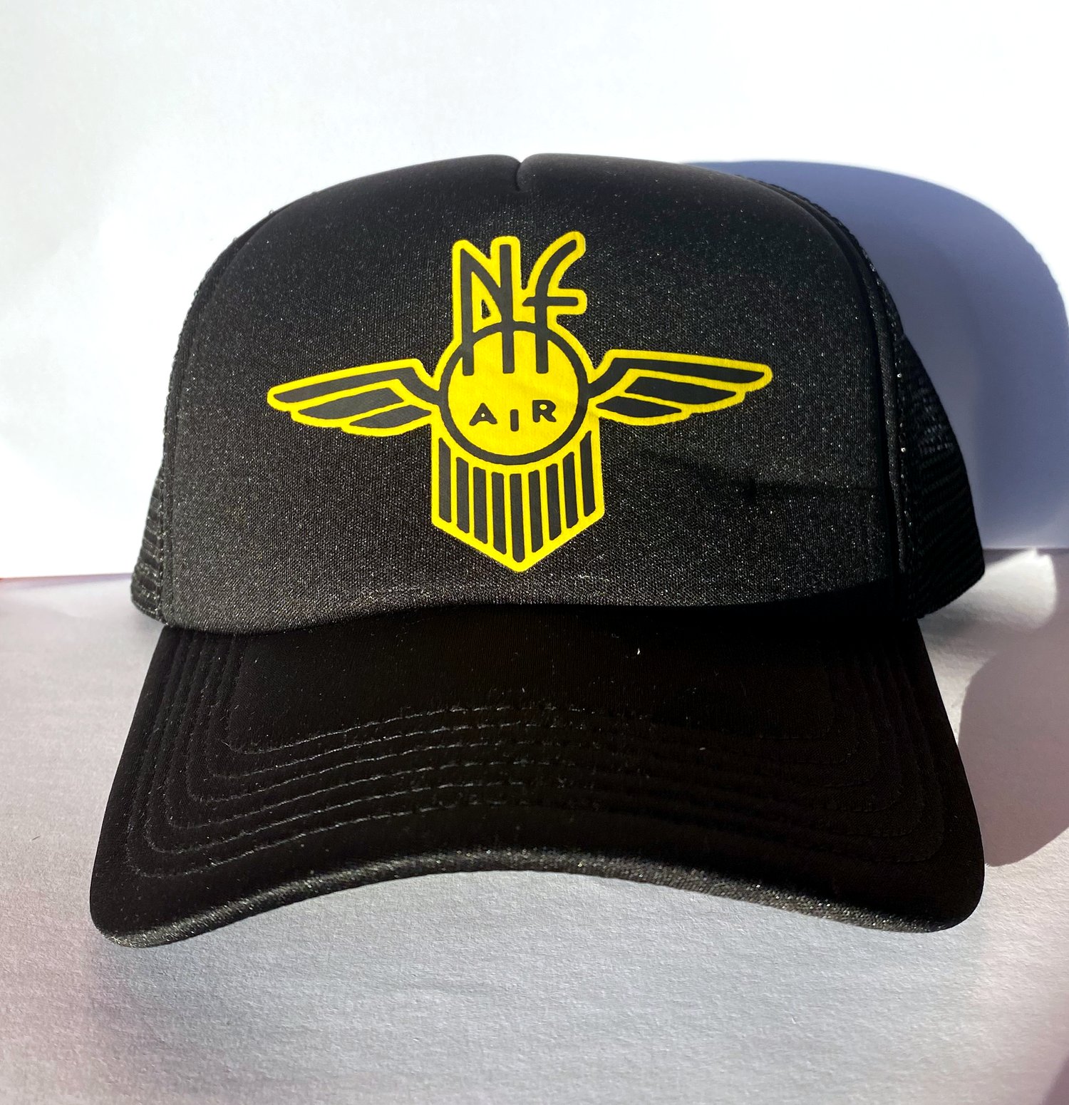 Image of THE NIGHT FLIGHT ORCHESTRA - AUSTRALIAN TRUCKER CAP 2023 - Black w/ NF AIR Emblem