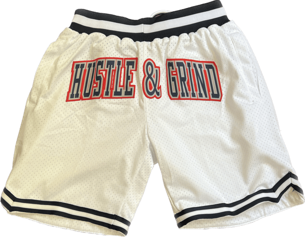 Image of Hustle & Grind Basketball Shorts White w/Red & Blue letters. 