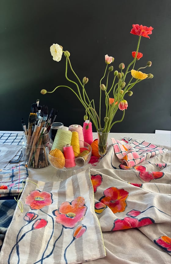 Image of Hand painting flowers on fabric with indigo and textile paint at The Toowoomba Gallery 