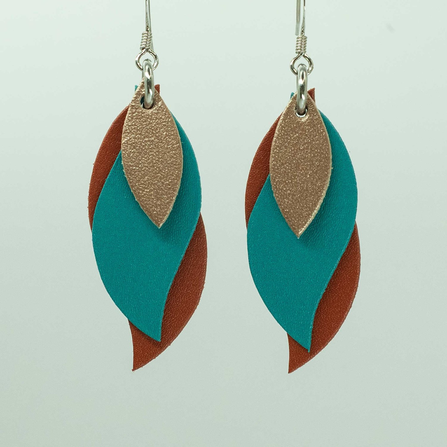 Image of Australian leather leaf earrings - Matte rose gold, teal green, saddletan