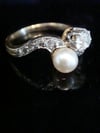 EDWARDIAN FRENCH 18CT YELLOW GOLD CULTURED PEARL AND OLD CUT DIAMOND TOI ET MOI