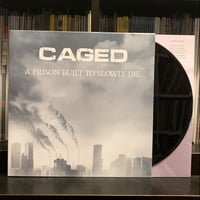 Image 1 of CAGED - A PRISON BUILT TO SLOWLY DIE