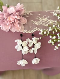Image 2 of Oversized White Flower Dangles (BLACK)