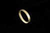Unique, handmade 18ct gold ring formed from shaped, geometric tapering D-shaped wire