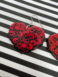 Image 2 of Heart skull 💀 earrings ❤️