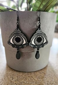 Image 1 of Monster Eye Hand-painted Black and White Horror Earrings