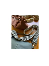 Image 1 of convertible leather crossbody + pouch