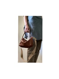 Image 4 of convertible leather crossbody + pouch