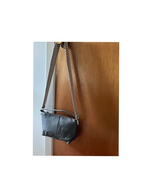 Image of convertible leather crossbody + pouch 