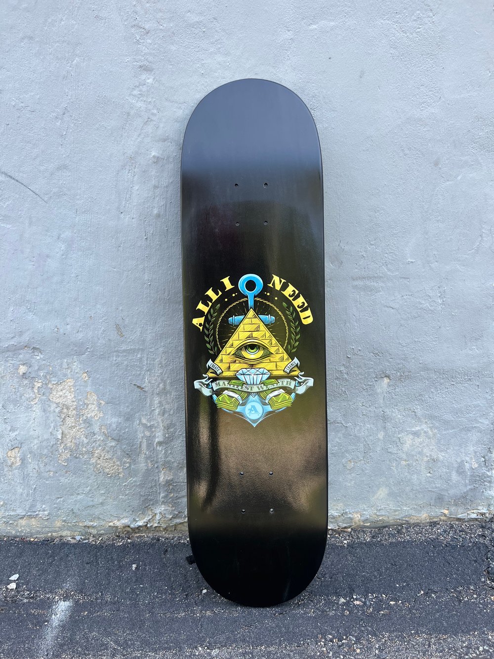 Black dipped Manifest All I Need skateboard