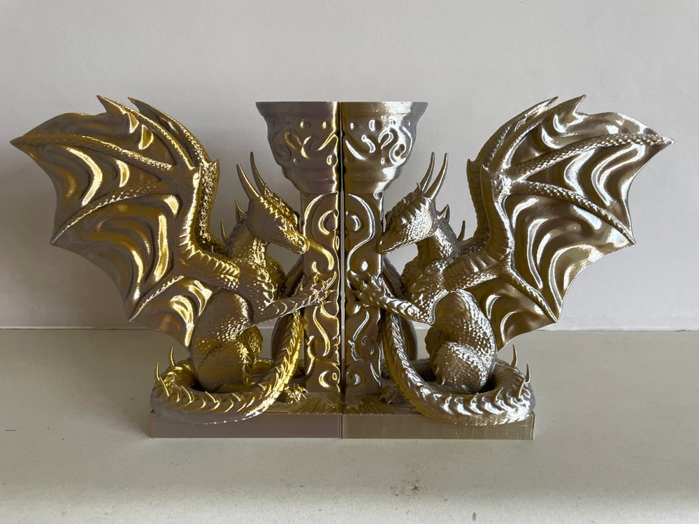 Image of Duel chrome shift dragon book ends