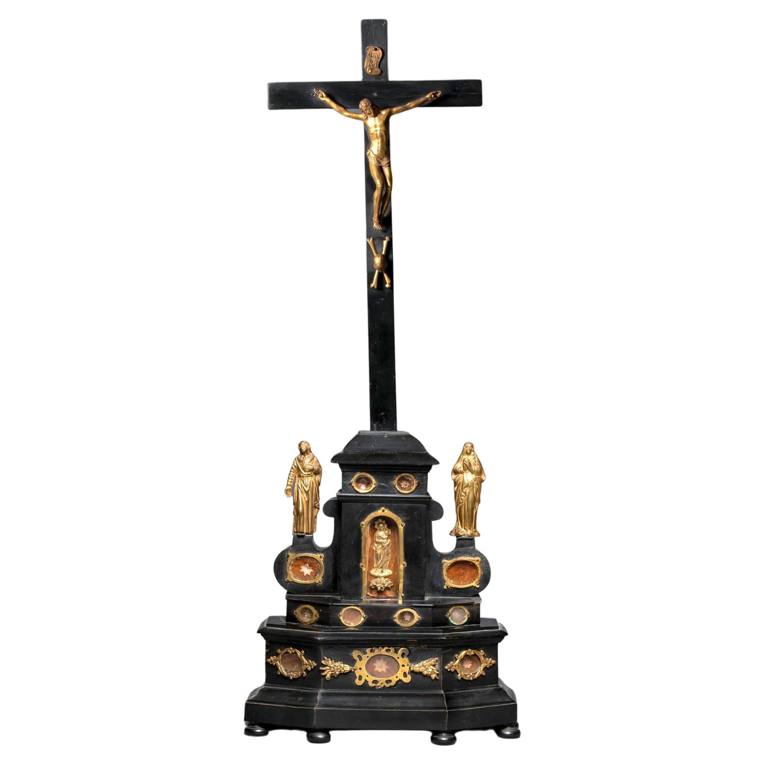 Image of An ebony wood and gilt bronze reliquary altar cross after Giambologna
