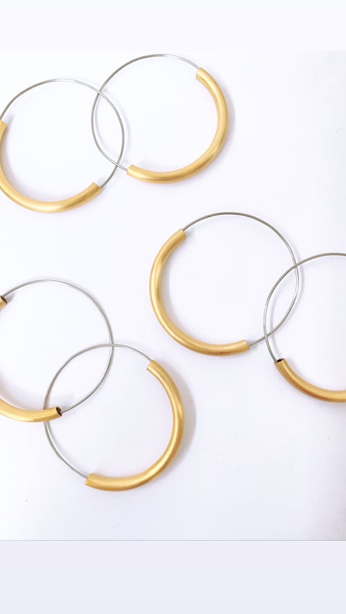 Image of Arracades Reflex acerOr. Pendientes Reflejo acerOro.