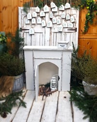 Image 1 of Wooden fireplace  white door