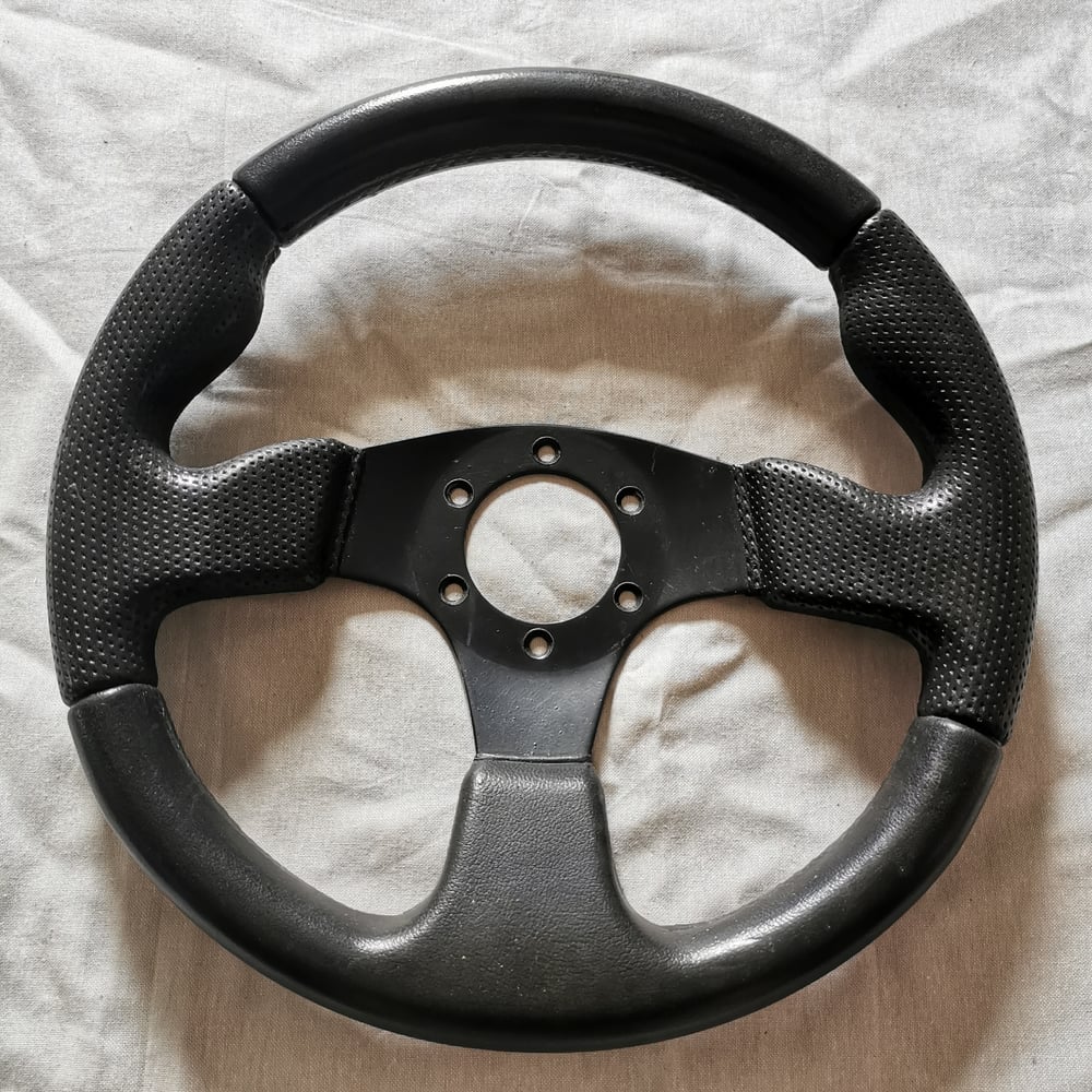 VOLANT SIK SIMILI CUIR  ET ALU NOIR