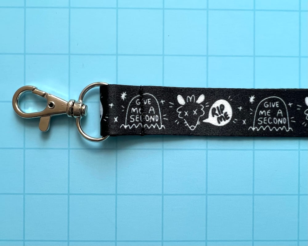 Image of Overstimulated possum lanyard