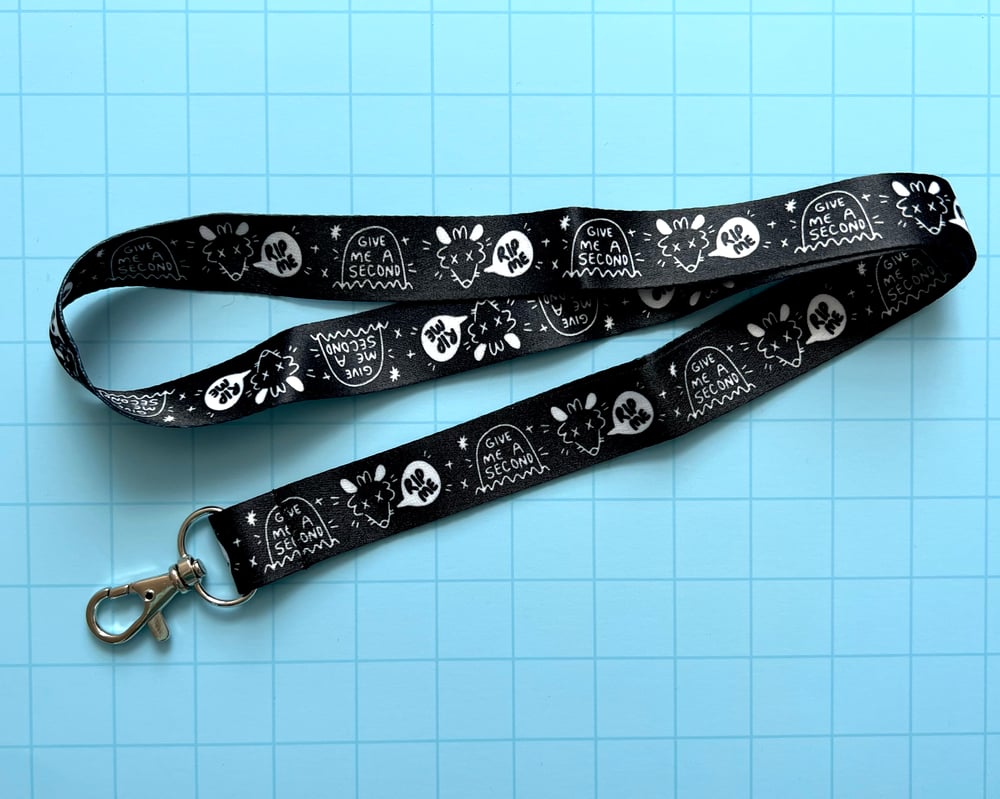 Image of Overstimulated possum lanyard