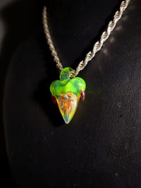 Image 3 of Silver fume implosion shark tooth pendant. 