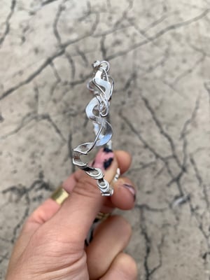 Image of ‘Closer’ sterling silver bangle 