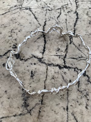 Image of ‘Closer’ sterling silver bangle