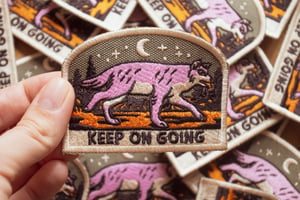 Sew-on, "keep on going" patch