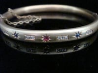 Image 1 of Edwardian 15ct matt yellow gold rose cut diamond sapphire ruby star bangle 9.6g