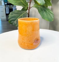 Image 1 of Orange Thumb Cup