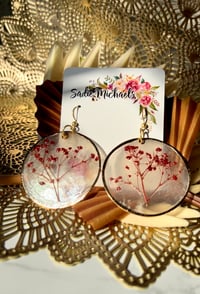 Image 1 of Dyed Baby's Breath on Capiz Shells