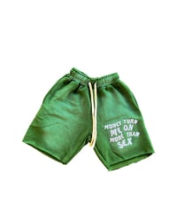 “MONEY TURN ME ON” green acid wash shorts