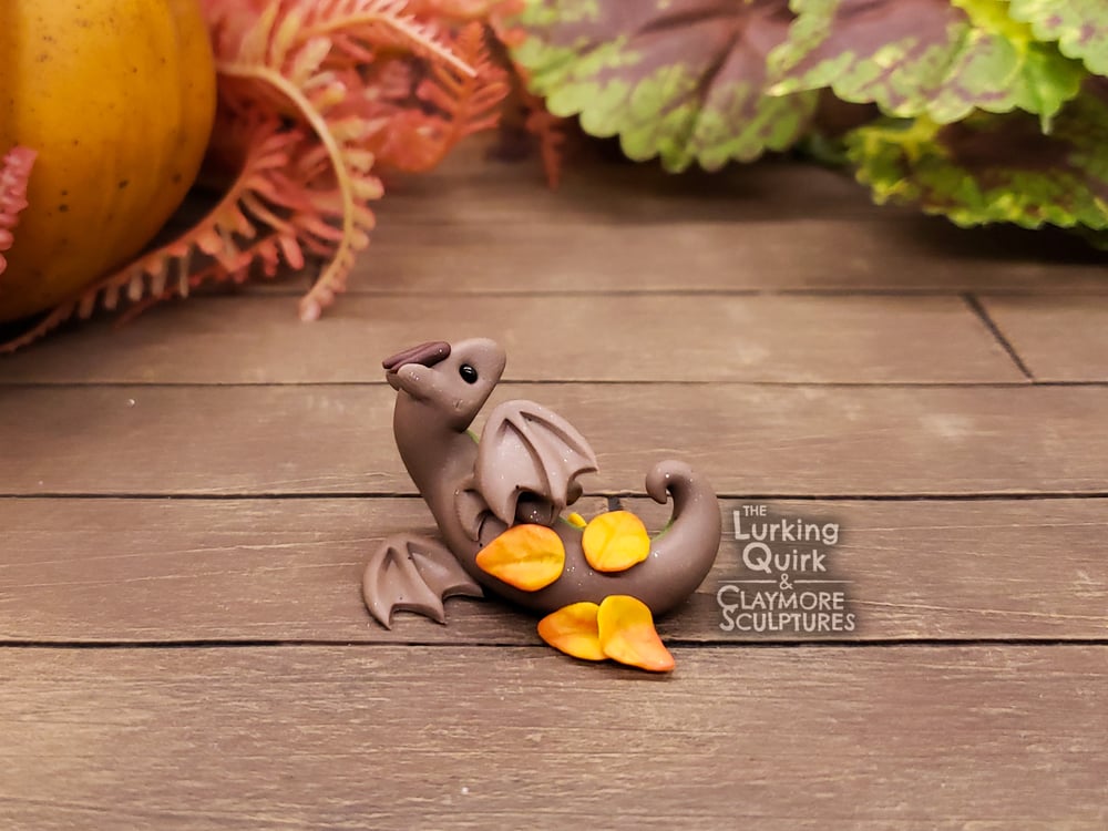 Mini Dragon in Autumn Leaves