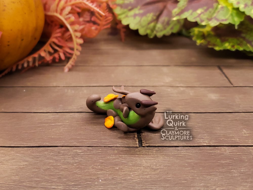 Mini Dragon in Autumn Leaves